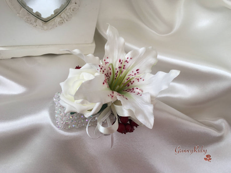 Small Tiger Lilies & Ivory Roses With Berries