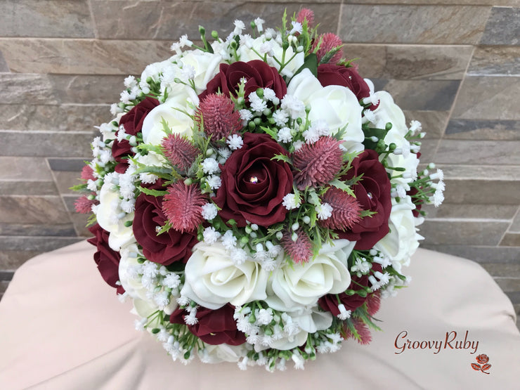 Burgundy Thistle With Foam Roses & Gypsophila