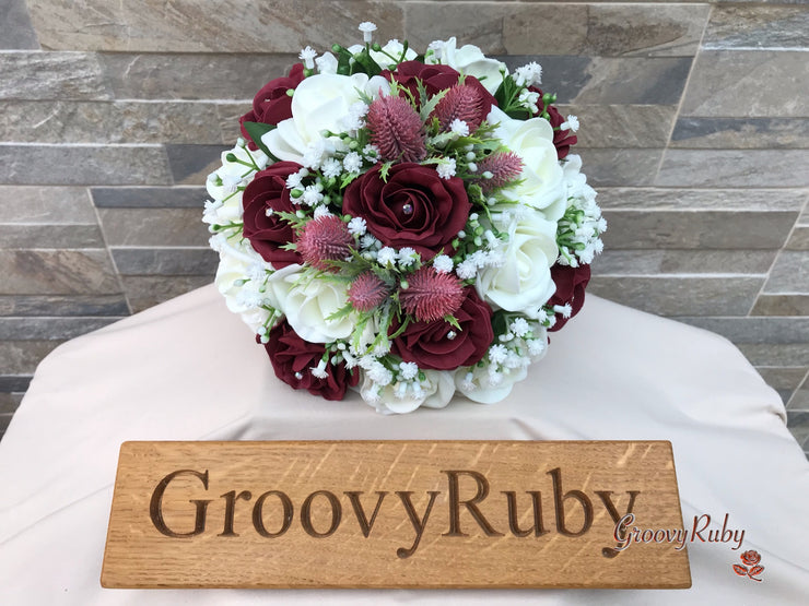 Burgundy Thistle With Foam Roses & Gypsophila