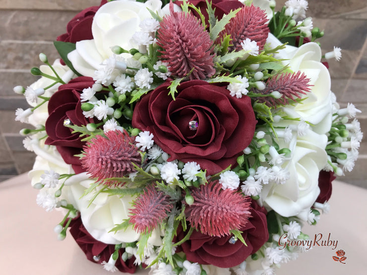 Burgundy Thistle With Foam Roses & Gypsophila