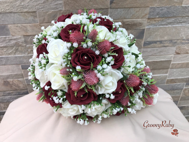 Burgundy Thistle With Foam Roses & Gypsophila