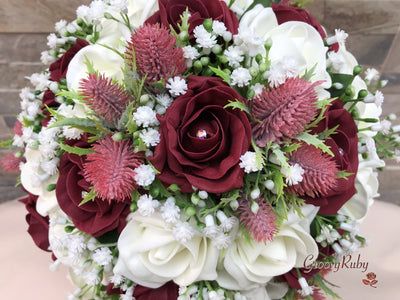 Burgundy Thistle With Foam Roses & Gypsophila
