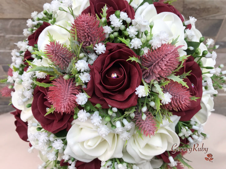 Burgundy Thistle With Foam Roses & Gypsophila