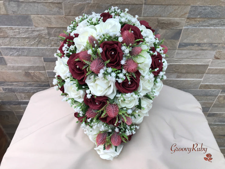 Burgundy Thistle With Foam Roses & Gypsophila