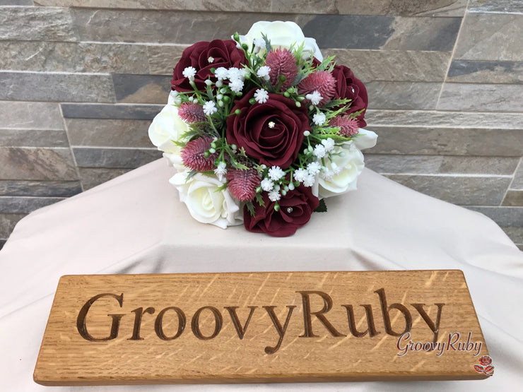 Burgundy Thistle With Foam Roses & Gypsophila