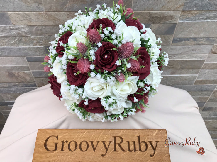 Burgundy Thistle With Foam Roses & Gypsophila