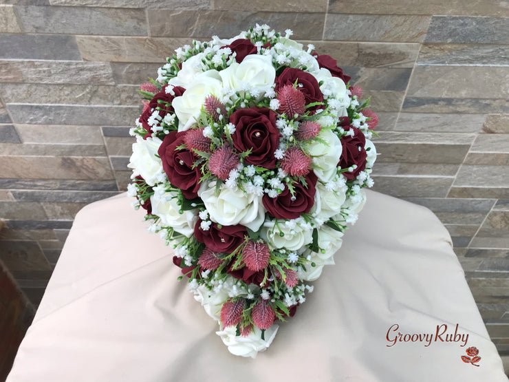 Burgundy Thistle With Foam Roses & Gypsophila