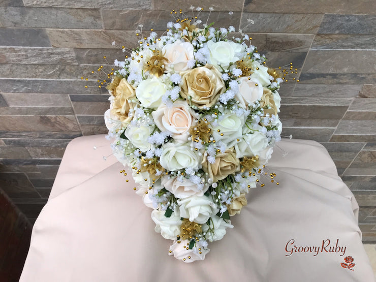 Champagne, Light Gold & Ivory Roses With Gypsophila