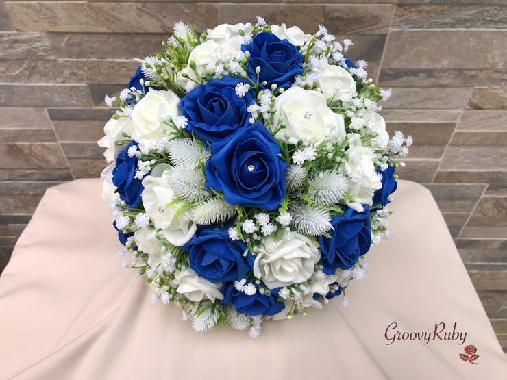 Royal Blue Foam Roses With Off White Thistle & Gypsophila